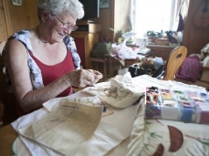 work in progress - one of the regolieri teaching valentina how to sew
