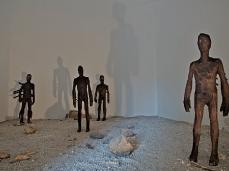 fabiano de martin topranin, creatures are coming!, sculptural installation, wood, gravel, rocks, variable sizes, 2011 – photo by a. montresor