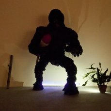 Gino Blanc, Kong plastic evolution, 2012, scultura con missile, polietine, ferro, CA2CO3, legno, bitume, colore ad olio, glitter, vetro, marmo, lingua mozzata, pianta in vaso, 230x120x110 cm., foto Giacomo De Dona